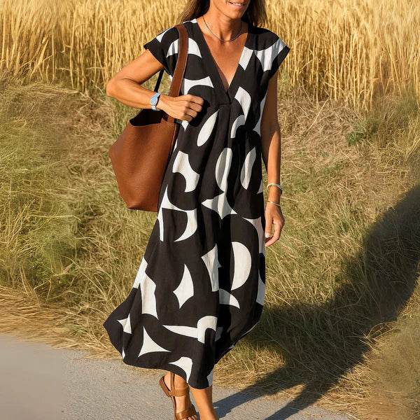 Eva™ | Flowing dress with V-neck