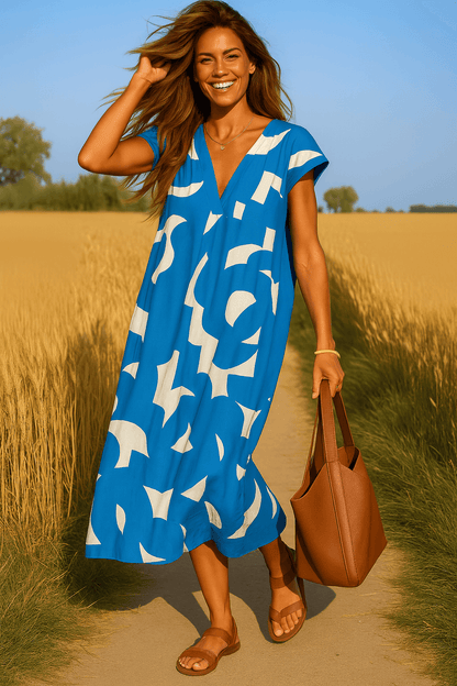 Eva™ | Flowing dress with V-neck